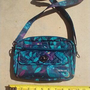 Lug Switch Crossbody Convertible Belt Bag. Peacock print.